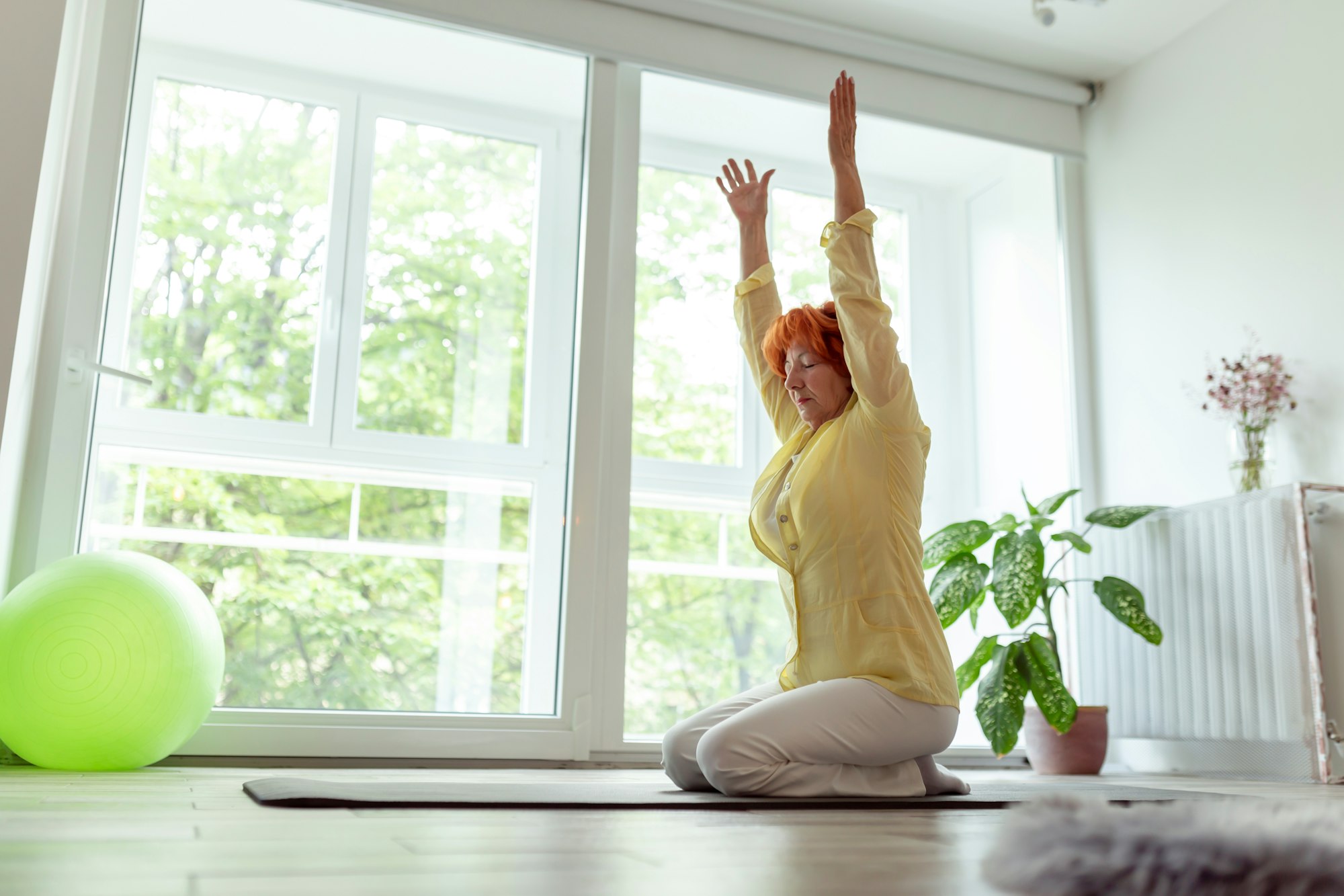 Senior woman doing yoga practice